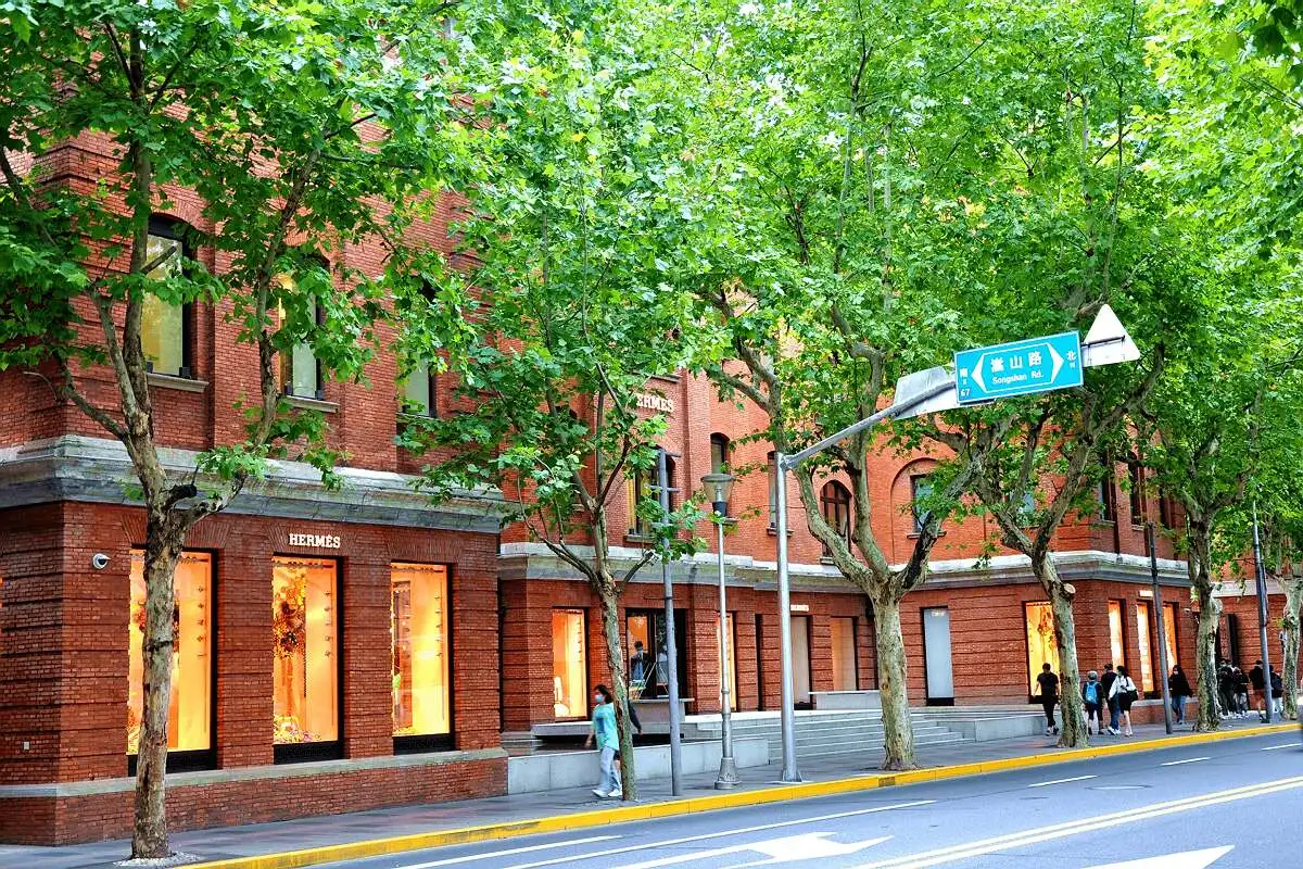Tree-lined street in Shanghai French Concession with old European buildings