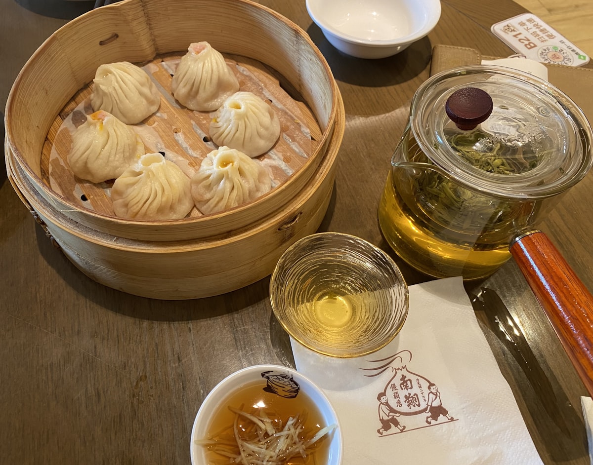 Traditional dim sum served in bamboo steamers at a Shanghai restaurant