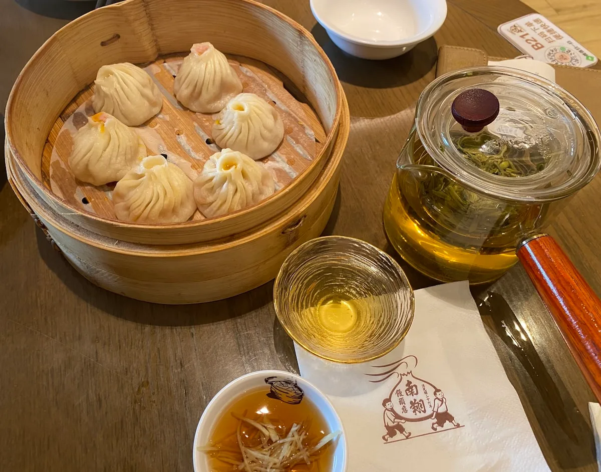 Traditional dim sum served in bamboo steamers at a Shanghai restaurant