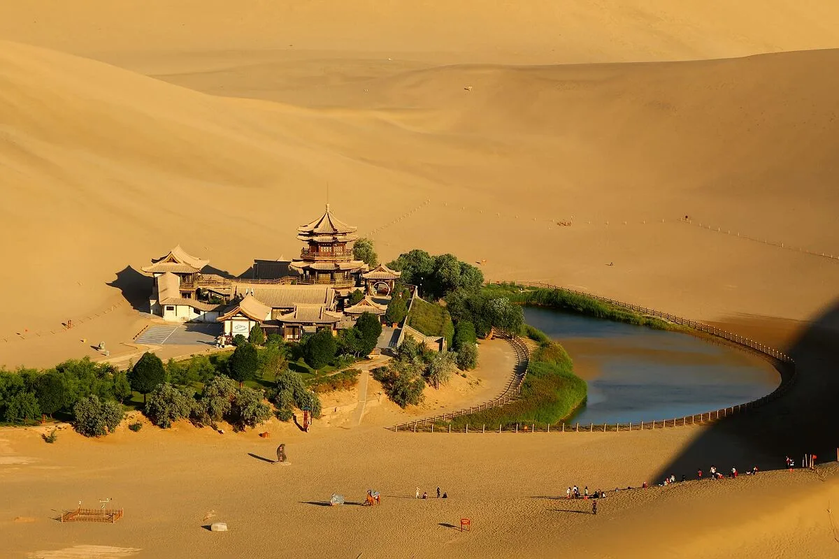 Crescent Moon Spring (Yueyaquan) — a crescent-shaped oasis nestled among towering sand dunes near Dunhuang, Gansu