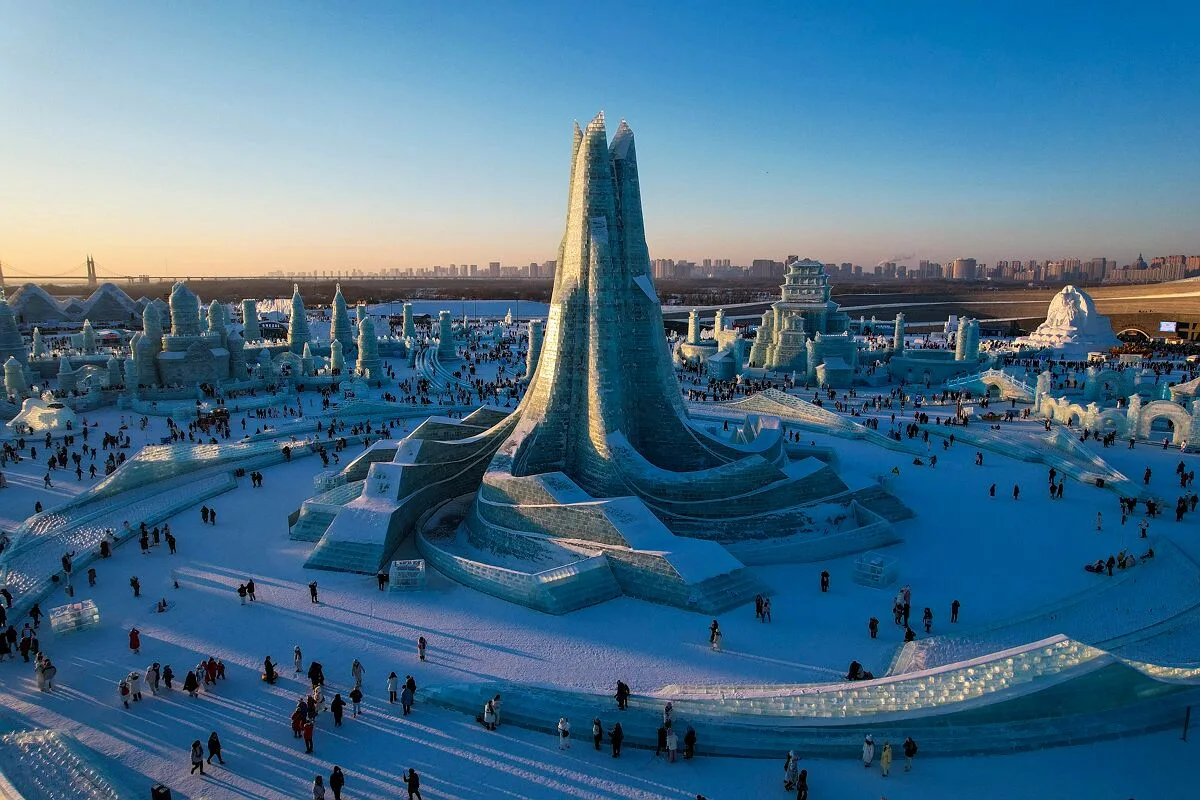 Harbin Ice and Snow World with massive illuminated ice sculptures at night