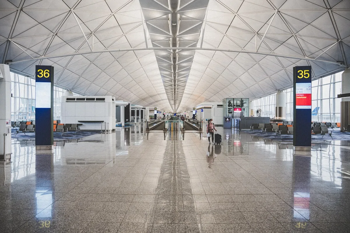 The departures hall of an international airport before a China flight