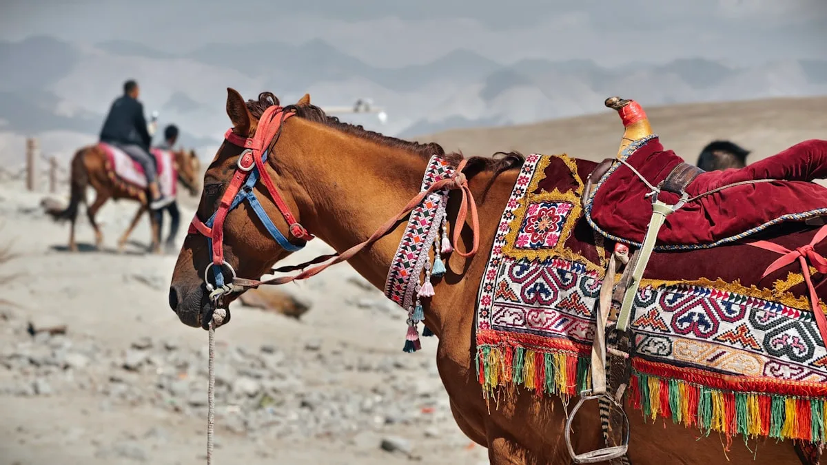 A brown horse with a saddle on its back