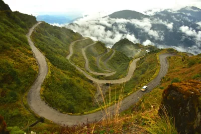 The 72 bends of China's G318 highway winding through misty mountains